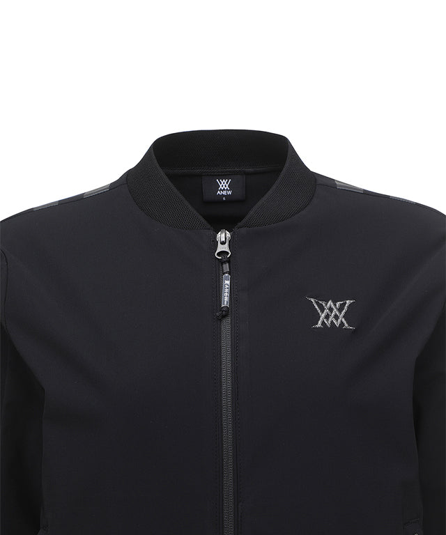 ANEW Golf Women's Signature Tricot Set Up Jacket in Black, featuring a glossy finish and stylish overfit design.